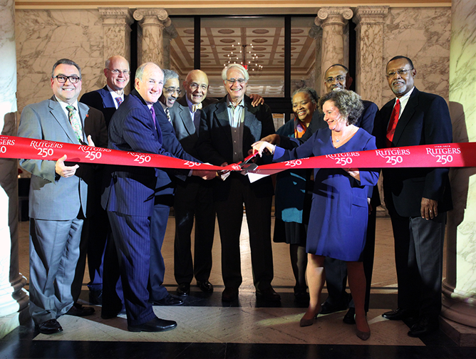 President Barchi and Nancy Cantor, chancellor of Rutgers University–Newark, join in cutting the ribbon for the newly restored 15 Washington Street building